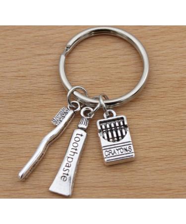 TARAKI Ancient Silver Toothpaste & Toothbrush Keychain | Unique Toothbrush Keyring & Zipper Pull - International Shipping - Buy Online on GoSupps.com