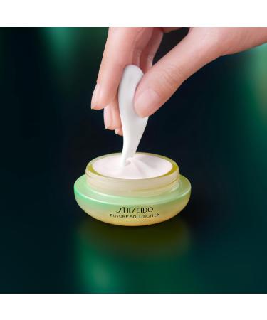 Shiseido Future Solution LX Ultimate Brilliance Eye Cream 15 mL | Targets Dark Circles Wrinkles & Dullness | Magatama Eye Massager | All Skin Types | Free International Shipping - Buy Online on GoSupps.com