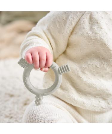 Baby Nom 100% Food Grade Silicone Teething Toy - Freezable & Multi-Textured Infant Teething Ring - BPA Free Teether in Cream White - Buy Online on GoSupps.com