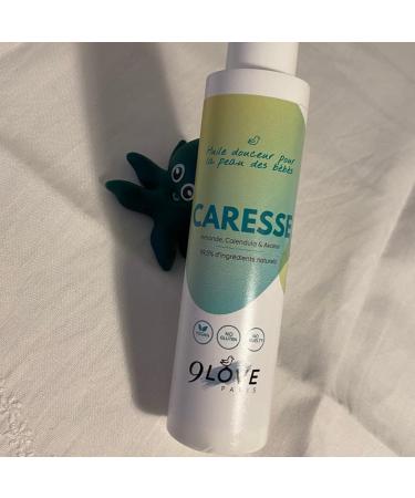 9LOVE - CARESSE - Baby massage oil - A soft envelope enriched with almond oats and calendula oats for a moment of tenderness with baby. 99.5% natural ingredients. - Buy Online on GoSupps.com