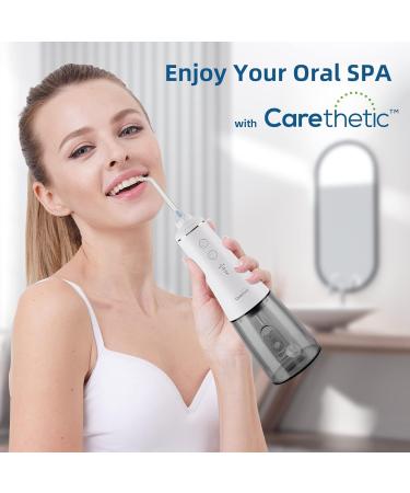 Water Dental Flosser Cordless | Carethetic Portable Oral Irrigator for Teeth Cleaning | Rechargeable IPX7 | Ideal for Home & Travel - Buy Online on GoSupps.com