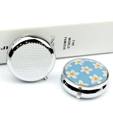 Round Pill Box with White Plumeria Pattern - 3 Compartment Decorative Metal Pill Organizer | Portable Pocket Pill Case - Buy Online on GoSupps.com