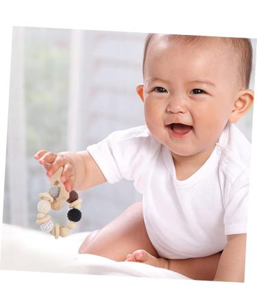 KOMBIUDA Silicone & Wooden Baby Teether Maracas | Musical Instruments & Teething Toy for Babies 0-6 Months - Buy Online on GoSupps.com