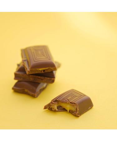 Tirma Milk chocolate bar filled with banana cream 110g | Creamy chocolate banana filling | Milk chocolate with mint filling | Banana chocolate dessert | Mint chocolate snack - Buy Online on GoSupps.com