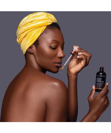 KREY L ESSENCE Haitian Black Castor Oil Chocolate Vanilla 2oz - Hair Growth and Shine Booster - Buy Online on GoSupps.com