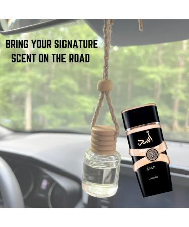 Bundle of Lattafa Asad 3.4oz Eau de Parfum with 5ml Portable Refillable Atomizer and Refillable Car Freshener in a Satin Gift Bag - Buy Online on GoSupps.com