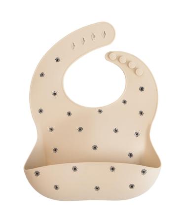 Mushie Baby Silicone Bib | Adjustable Fit Waterproof Bibs | Easy Wipe Baby Feeding Bibs | 4 Adjustable Sizes with Deep Front Pockets | 100% BPA and Phthalate Free Black Daisy