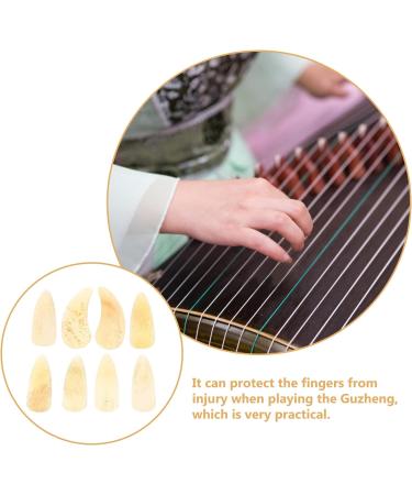 HAKIDZEL 8pcs Guzheng nails ukelele pick guzheng ox horn pick mandolin picks Guzheng Nail Covers Guzheng Finger Picks thumb picks Fingertip Covers guzheng picks Guitar Ukulele child horns 2.7X1.2X0.1CM Yellow - Buy Online on GoSupps.com