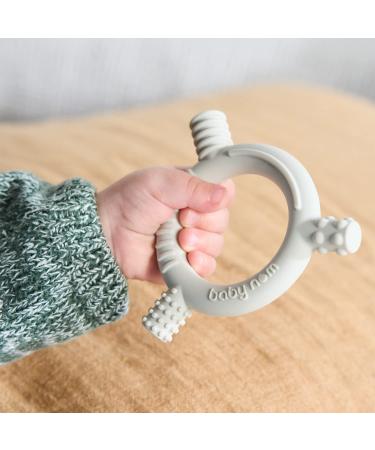 Baby Nom 100% Food Grade Silicone Teething Toy - Freezable & Multi-Textured Infant Teething Ring - BPA Free Teether in Cream White - Buy Online on GoSupps.com