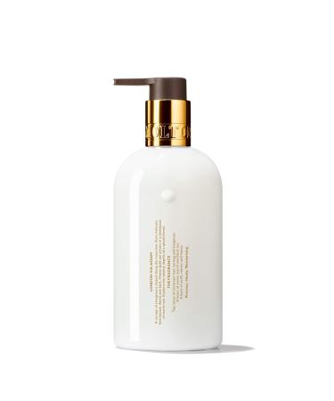 Molton Brown Mesmerising Oudh Accord & Gold Hand Lotion 300ml - Luxurious Hydration Old Version International Shipping Available - Buy Online on GoSupps.com