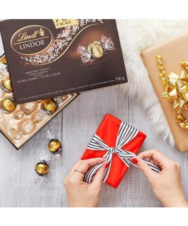 Lindt LINDOR 70% Cacao Dark Chocolate Truffles Gift Box 156 Gram Box Chocolate Gift Box Perfect for Gifting - Buy Online on GoSupps.com