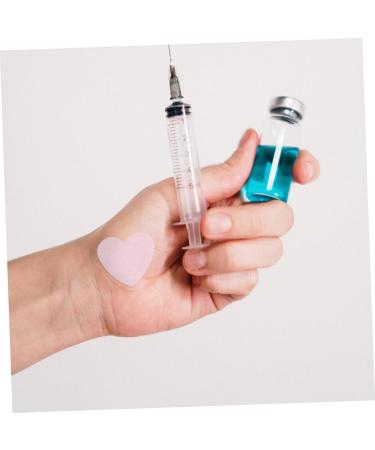 150 Pcs Alien Heart Shaped Bandages - Fun Cartoon Burn & Pressure Injury Care for Kids | International Shipping - Buy Online on GoSupps.com