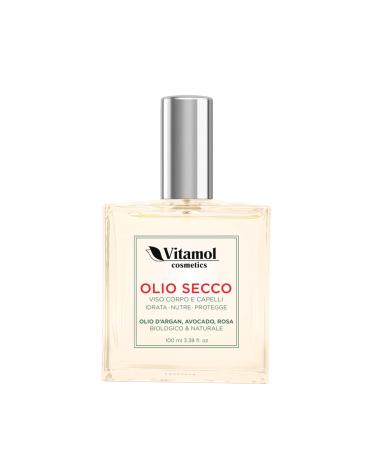 Organic and natural dry oil that moisturises nourishes and protects face body and hair with argan avocado and rose