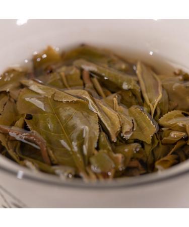 HQZM Yunnan Bulang Mountain Pure Material Big Tree Puer Raw Tea 357g Rich in Flavor and History - Buy Online on GoSupps.com