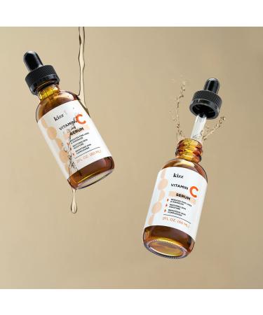 KIZZ Vitamin C Serum with Hyaluronic Acid, Vitamin E, Aloe & Jojoba Oil - Brightens and Moisturizes Skin, Reduces Fine Lines and Wrinkles - 2 fl. Oz - Buy Online on GoSupps.com