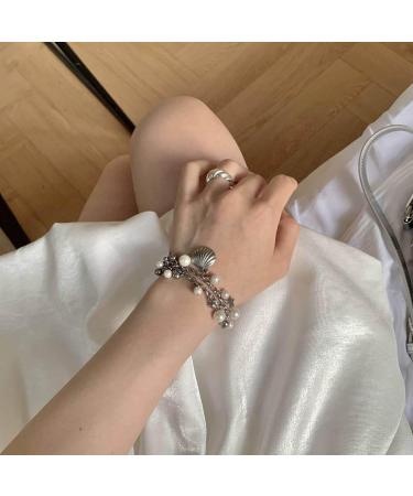 Shop Oralgo's Handmade Natural Pearl Bracelet with Unique Shell Pendant - Adjustable Jewelry for Parties | Durable Stainless Steel Chain - Buy Online on GoSupps.com