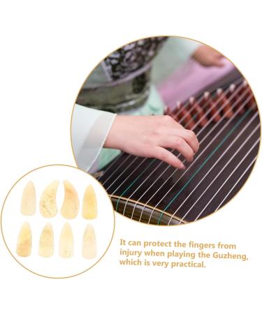 8pcs Guzheng nails thumb picks guitar picks for kids acoustic guitar plectrums Guzheng Accessories guzheng ox horn pick thin guitar picks child protective cover horns portable 2.5X1.2X0.1CM Light Yellow 03 - Buy Online on GoSupps.com
