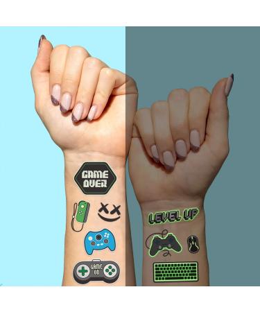 XO Fetti Video Game Party Supplies Temporary Tattoos - 40 Glow in the Dark Styles | Gamer Birthday Decorations - Buy Online on GoSupps.com
