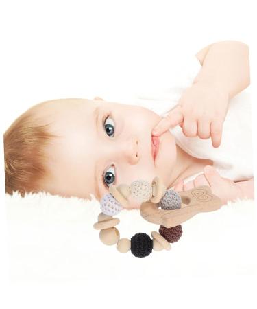 KOMBIUDA Silicone & Wooden Baby Teether Maracas | Musical Instruments & Teething Toy for Babies 0-6 Months - Buy Online on GoSupps.com