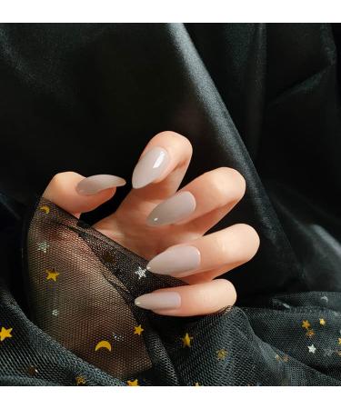 Justotry 24 pieces glossy solid stiletto nails for sticking out medium nude French press on nails simply almond art nail fake nails short with glue fingernails artificial nails for women nude & solid 1