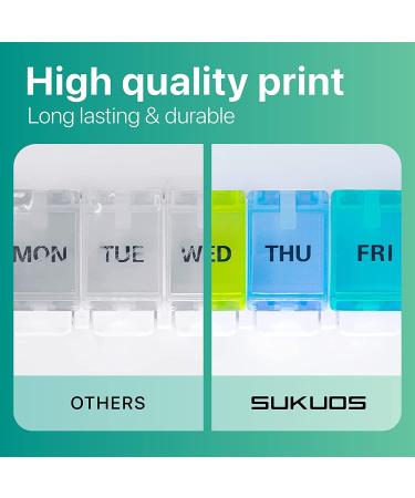Sukuos Large Weekly Pill Organizer - 7 Day Portable Pill Box for Medications Vitamins & Supplements | Easy Push Button Rainbow Design - Buy Online on GoSupps.com