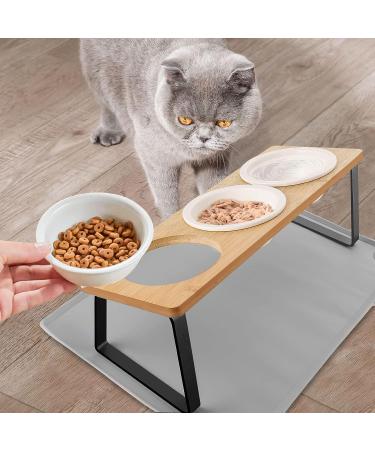 Otoomenz Cat Bowl Ceramic Cat Food Bowls With 15 Tilted Wood Stand Raised Cat Bowls for Food and Water Bamboo Cat Feeding Station with Cat Food Mat for Cats and Puppy (3 Bowls with Stand) - Buy Online on GoSupps.com