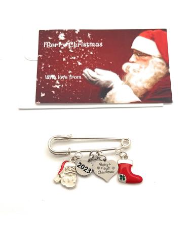 Baby's First Christmas 2023 Keepsake Brooch with Santa and Stocking Charms (Organza Gift Bag)