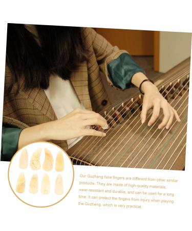 8pcs Guzheng nails thumb picks guitar picks for kids acoustic guitar plectrums Guzheng Accessories guzheng ox horn pick thin guitar picks child protective cover horns portable 2.5X1.2X0.1CM Light Yellow 03 - Buy Online on GoSupps.com
