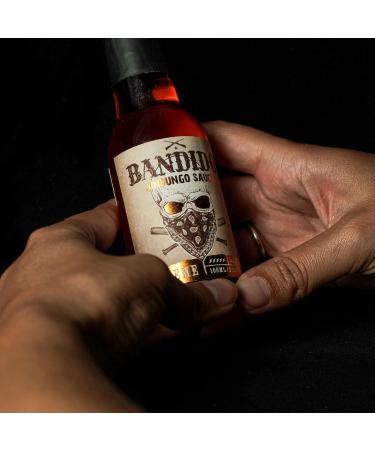 Fifth of Jugais Jindungo Banddo Hete Sous 100 ml bottle Sause with Angolesis Wortels Based from Jindungo pepper sunflower oil and lemon Fineproofprofile - Buy Online on GoSupps.com