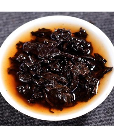 Th Puer m r Yunnan Th noir Tong Qing Hao 357g G teau au th Pu-erh Th chinois - Buy Online on GoSupps.com