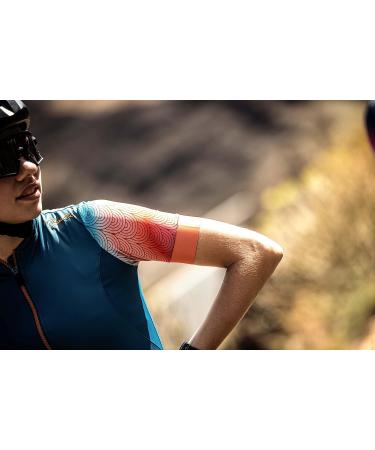 Shop Rogelli Waves Women's Short Sleeve Cycling Jersey - Breathable Road Bike Shirt in Light Blue & Coral - Buy Online on GoSupps.com