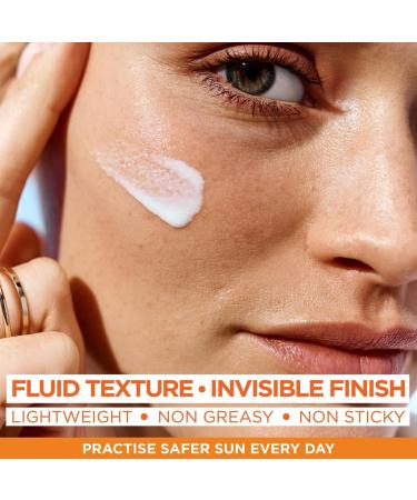 Garnier Ambre Solaire Daily UV Fluid SPF50+ Corrects & Prevents Dark Spots Boosts Glow Invisible Finish Super UV Vitamin C 40ml - Buy Online on GoSupps.com