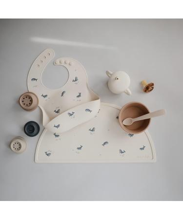 Mushie Baby Silicone Bib | Adjustable Waterproof Bibs with Deep Pockets | Easy Wipe, BPA-Free Feeding Bibs for Babies | Whales Design - Buy Online on GoSupps.com