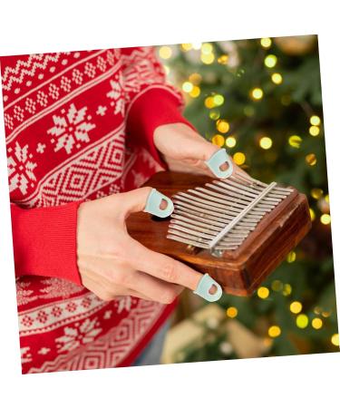 Buy 2 Pairs Kalimba Finger Cots - Guitar Thumb Sleeves for Optimal Play | International Shipping Available - Buy Online on GoSupps.com
