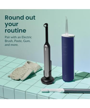 Buy Quip Water Flosser - Cordless Rechargeable Dental Pick with Adjustable Pressure & 360 Rotating Tip - Midnight Blue - International Shipping Available - Buy Online on GoSupps.com