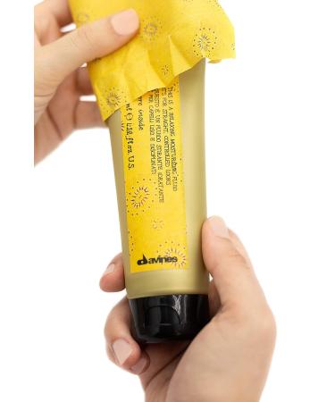 Davines Relaxing Moisturizing Fluid 4.22 Fl. Oz. | Heat Protection, Frizz Control, Sleek & Straight Styling - Buy Online on GoSupps.com