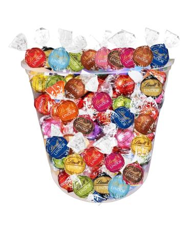 LINDT | 100 LINDOR bites with Original and Exclusive flavors | Assortment of Dark White Milk Chocolate - 1.25 kg | Of