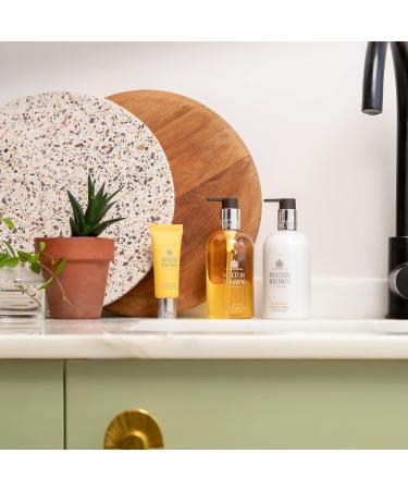 Molton Brown Flora Luminare Hand Lotion 300ml - Luxury Hand Cream Rejuvenating Moisturizer International Shipping Available - Buy Online on GoSupps.com