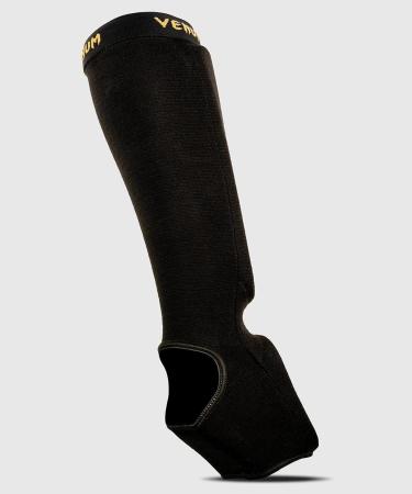 Shop Venum Uni Kontact Shin and Foot Guard S - Black/Gold | Premium Protection for International Shipping - Buy Online on GoSupps.com