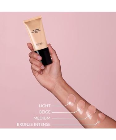 atashi DD Cream Anti-Aging Treatment with Color. No Makeup. Reduces Stains and Minimizes Pores. With Retinol. Airless Format. Intense Bronze. SPF15-50ml - Buy Online on GoSupps.com