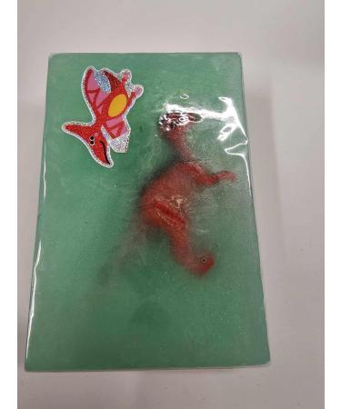 Dinosaur figure inside soap 8x5x2cm soaps fragrance free suitable for sensitive skin colours and dino will vary