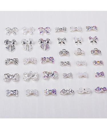JERCLITY 33 Pcs Silver Alloy Bow Nail Charms - Iridescent Rhinestone & Pearl Nail Art Studs for Women & Girls - Buy Online on GoSupps.com