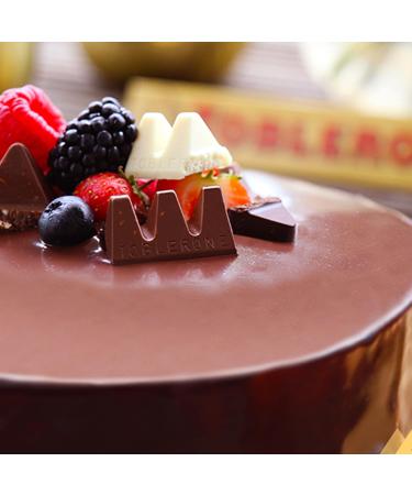 Toblerone Mix Box Transparent Tin 904g - 113 Mixed Minis for International Shipping | Premium Chocolate Gifts - Buy Online on GoSupps.com