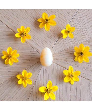 Yoni egg made of yellow jade small perforated