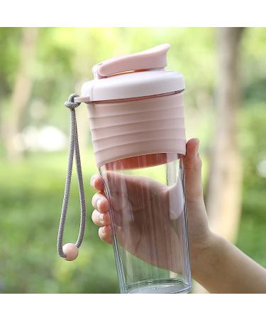 OUOUMUF Protein Shaker 700ml - BPA-Free Durable & Odor-Neutral Cup for Creamy Fitness Shakes - Modern Transparent Pink Design - Buy Online on GoSupps.com