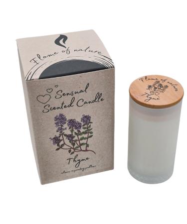 Sensual fragrance candle flame of nature in crystal glass made of soy wax and 100% from natural thyme etheric oil for aromatherapy spiritual growth and general well -being