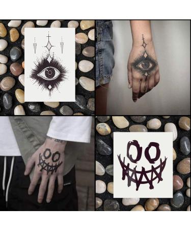 Oottati Waterproof Halloween Temporary Tattoo Stickers - 9 Sheets Black Skull Eye Devil Sun Moon Totem - Buy Online on GoSupps.com