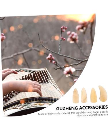 POPETPOP 8 Pcs Guzheng nail pieces Guzheng Tools instrument fake nails false nail tips Finger thumb picks Guzheng Nail Covers guitar nail picks portable child erhu musical instrument horns 3X1.2X0.1CM Light Yellow - Buy Online on GoSupps.com