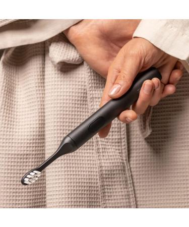 SURI Sustainable Sonic Toothbrush - Eco-Friendly Electric Toothbrush with Recyclable Plant-Based Head - 2 Modes, Waterproof, USB Charging - Midnight Black - Buy Online on GoSupps.com