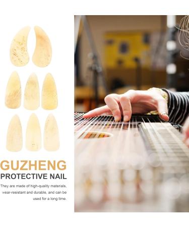 HAKIDZEL 8pcs Guzheng nails ukelele pick guzheng ox horn pick mandolin picks Guzheng Nail Covers Guzheng Finger Picks thumb picks Fingertip Covers guzheng picks Guitar Ukulele child horns 2.7X1.2X0.1CM Yellow - Buy Online on GoSupps.com